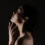 beautiful-profile-half-naked-gentle-woman-posing-camera-with-closed-eyes-isolated-black